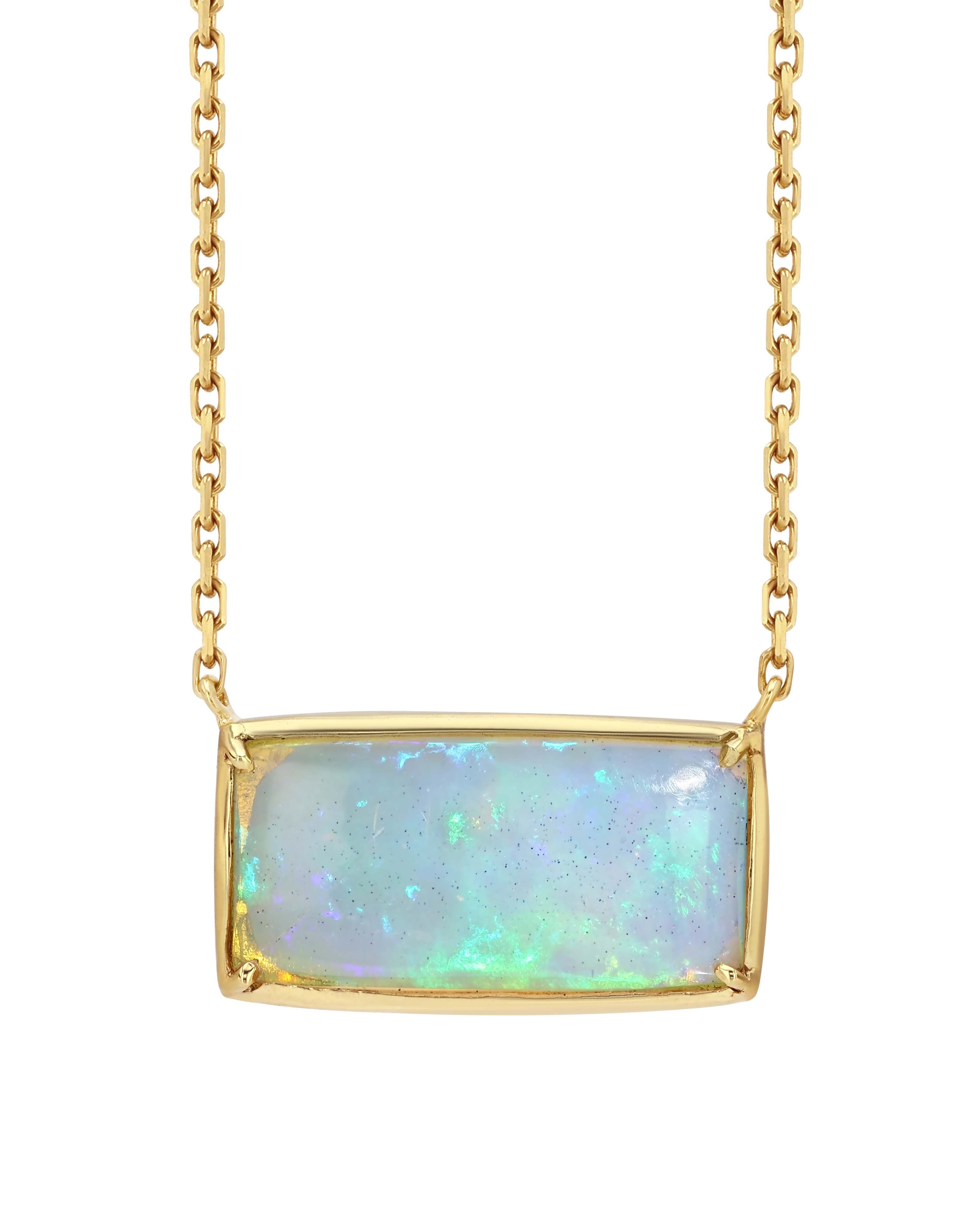 Opal necklace with gold frame on a white background